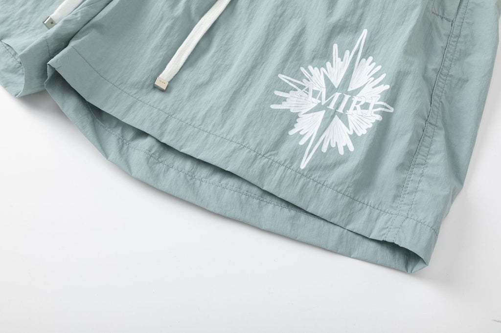 AMIRI Starburst logo shell swim shorts